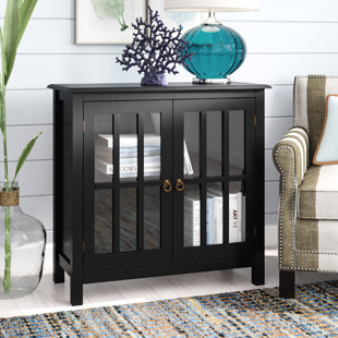 Small accent cabinet with glass outlet doors